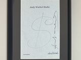 a framed picture of andy warhol ' s signature on the wall
