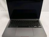 a laptop computer that is sitting on a table
