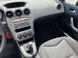 a dashboard of a car with a steering wheel and dashboard controls