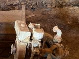 an old machine that is sitting in the dirt