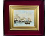 tableau à l'huile encadré représentant une vue d'un port avec un voilier
