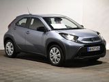 the toyota c - hr is parked in a garage with a checkered floor