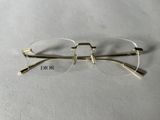 a close up of a pair of glasses on a table