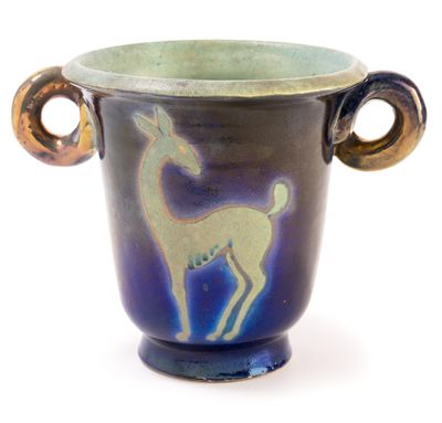 a blue vase with a deer on it on a white background