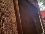 a picture of a wood paneled wall in a room