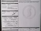 a close up of a document with a barcode on it