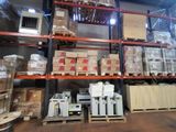 a lot of boxes on the shelves in the warehouse