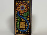 an image of a decorative box with a flower on it
