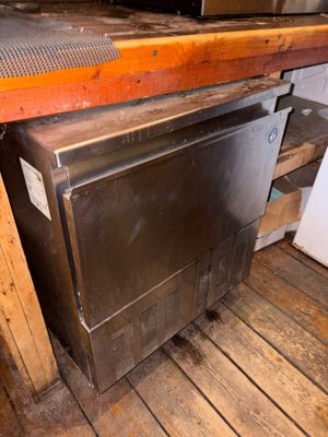 an image of a kitchen with a stove and a dishwasher