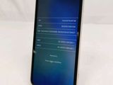 the back of a black samsung s9 phone with a display on it