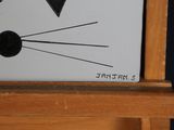 a picture of a painting of a cat on a easel