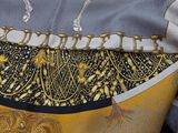 a close up of a purse with a pattern on it