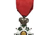 l'image d'une médaille surmontée d'une étoile