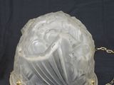a glass dome with a chain around it on a black background