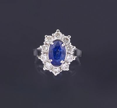 a sapphire and diamond cluster ring