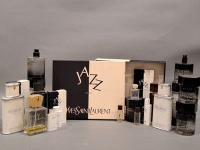 many different types of perfumes in a box