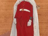 painting of a man dressed in a red coat and white cape