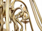 a gold colored chandelier with a white background