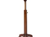 a wooden table with a metal top and a wooden base