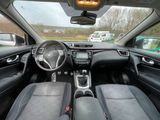 a view of the inside of a car from the driver ' s seat