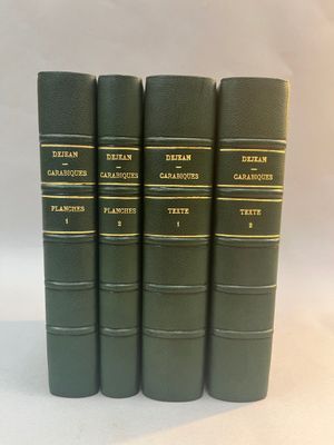 a set of five green books sitting on top of each other