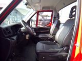 an image of a red truck with black leather seats