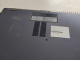 a laptop that has a sticker on the back of it