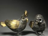 paire de figurines d'oiseaux en argent et en or