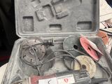 an open tool case with tools in it on a table