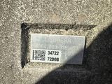 a sign on the side of a concrete wall