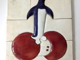 un carreau sur lequel figurent un pingouin et un chat