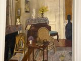 a painting on the wall of a room with a chair and table
