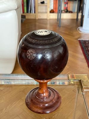 a glass table with a vase on top of it