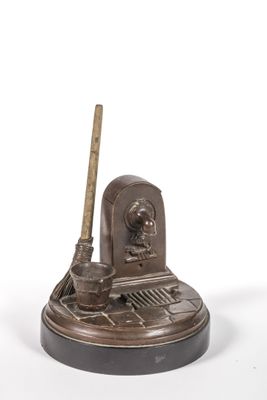 an image of a bronze figurine of a man with a baseball bat