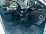 a picture of a car inside of a building
