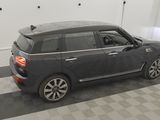 an image of a minivan parked in a garage