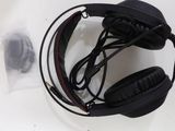 a pair of black headphones on a white table