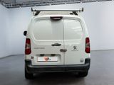 a white van that is parked in a room