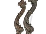 pair of antique cast iron door handles in the shape of a dragon