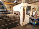 a machine that is working on a piece of metal