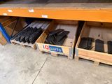 a shelf with several pairs of shoes on it in a store