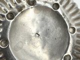 a close up of a metal object on a table