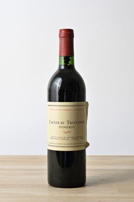 a bottle of wine that is sitting on a table