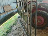 a tractor that is parked inside of a barn