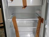 a refrigerator that has been taped up with tape