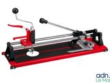 a close up of a red and black machine on a white background