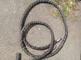 a hose on the ground next to a hose on the ground