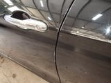 a close up of a car door handle and door handle