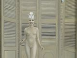 un tableau représentant une femme debout devant une porte ouverte