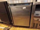 a stainless steel refrigerator and freezer in a kitchen